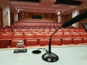 A view of empty auditorium from speaker's viewpoint.