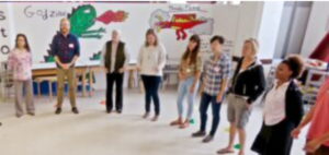 Employees standing next to each other at a daycare center.