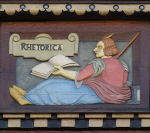 Old German wood carving saying "Rhetorica."