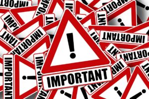Triangle road signs with exclamation point and the word "important."
