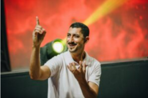 A speaker moving his arms.