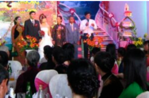 Speaking at a wedding reception.