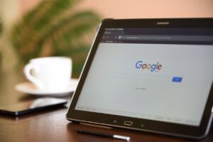 A tablet screen with Google main page showing.