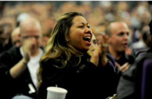 Audience members.